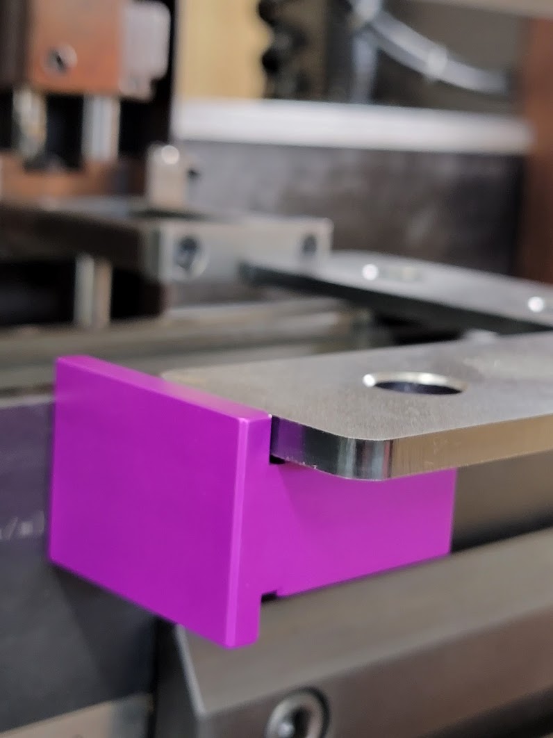 Magnetic squaring arm