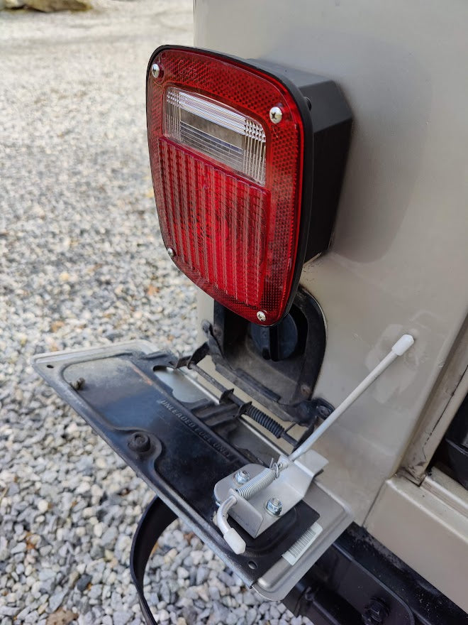 License Plate Caddy (Gas Hatch Latch)